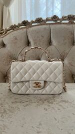 Chanel 
Mini Bag White Leather